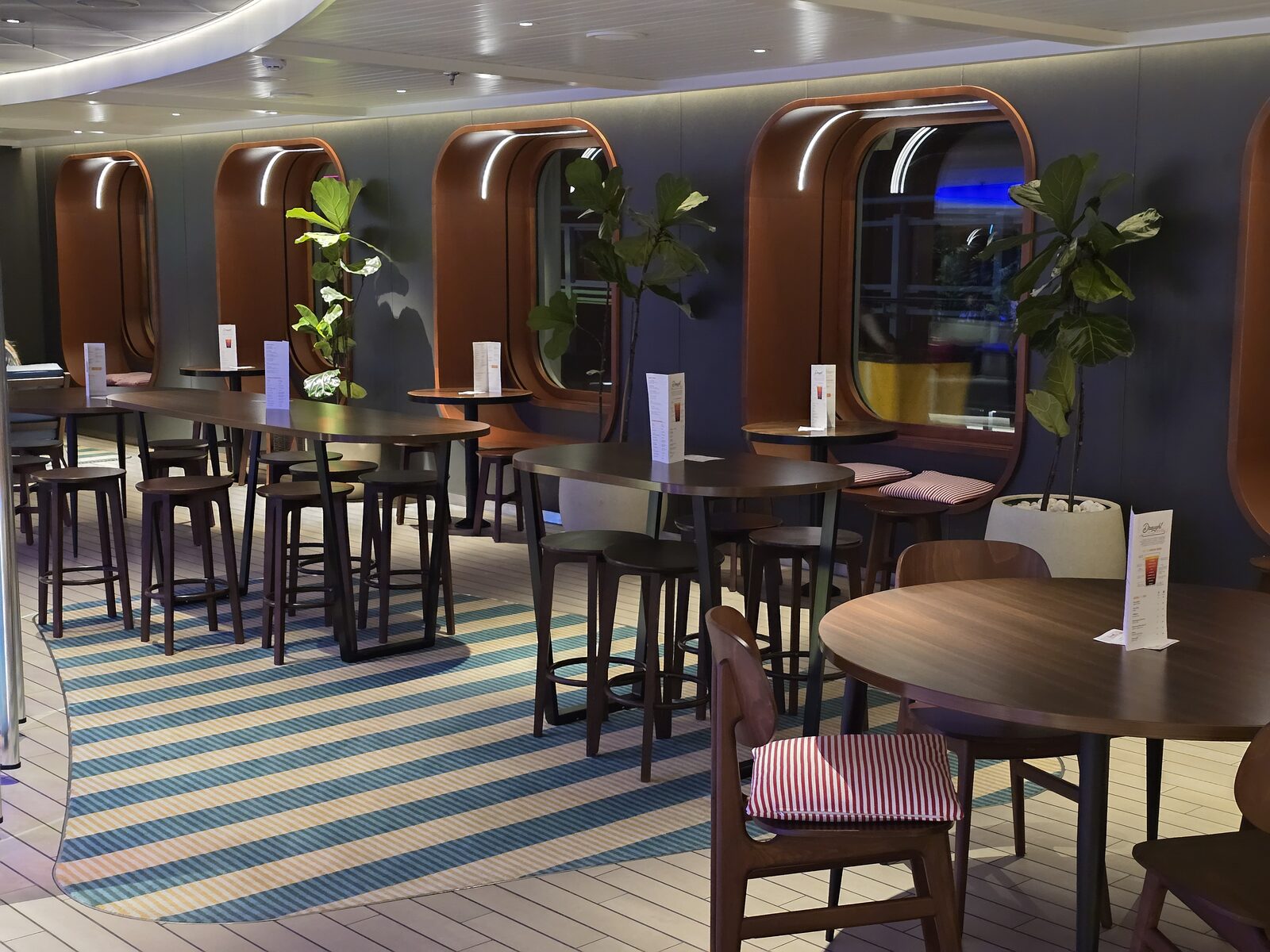 Seating at Draught Haus on Virgin Voyages