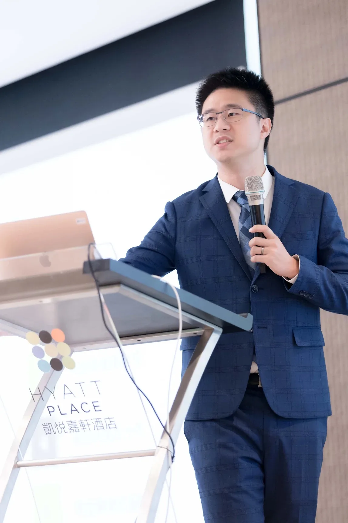 Danny speaking at an event